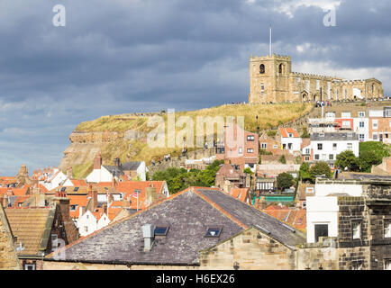 View over rooftops towards the 199 steps and St Mary`s church in Whitby, North Yorkshire, England. UK Stock Photo